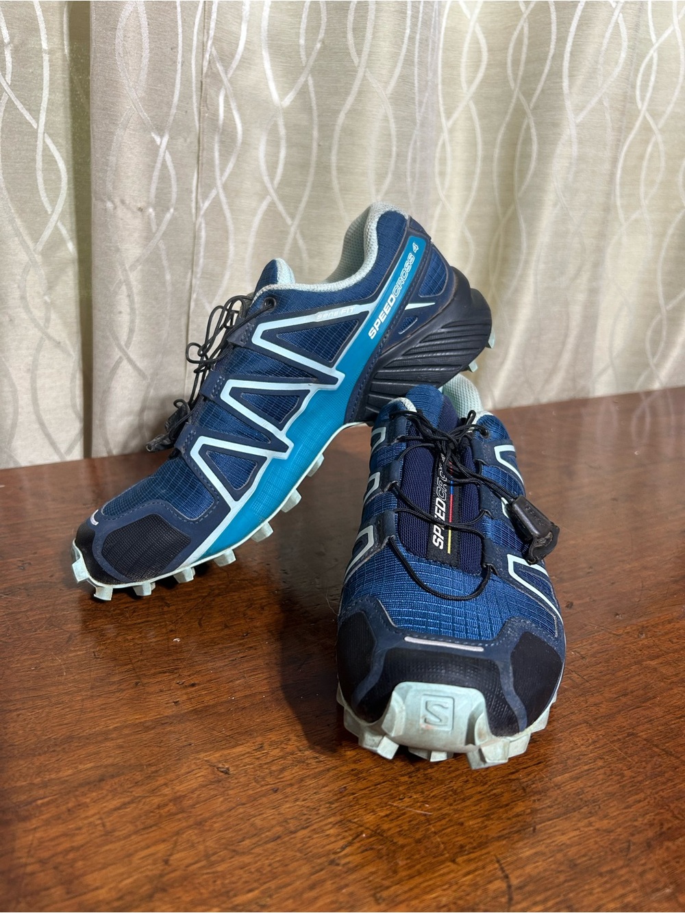 Salomon Speedcross 4 Trail Runners in Navy with Teal Accents